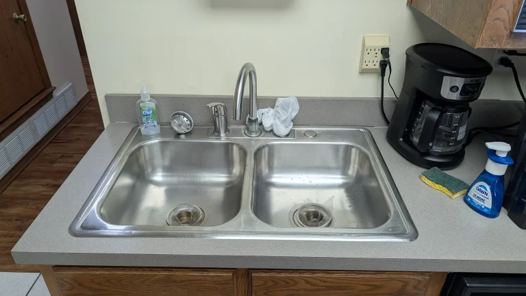 The Crouch Group faucet before.